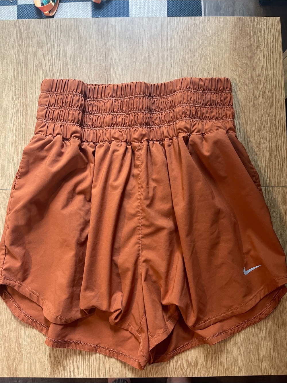 Nike Women's Burnt Orange Smocked-Waist Athletic Shorts